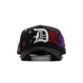 Frontal de gorra Dandy Hats negra con letras “DANDY” bordadas en colores brillantes y visera curva