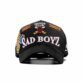 Gorra negra Dandy Hats “Como Jordan” con bordado frontal SAD BOYZ y parches multicolor 2024.