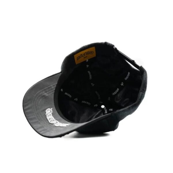 Inside View of pLAid Cap Interior view of the pLAid hat showing satin lining, inner branding, and structured design.