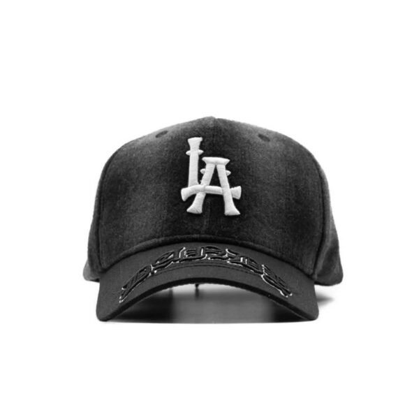 Black pLAid cap featuring raised LA embroidery and Dandy gothic script on the brim, front view.